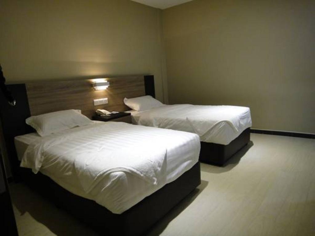 Galaxy Hotel Simpang Ampat  Zimmer foto